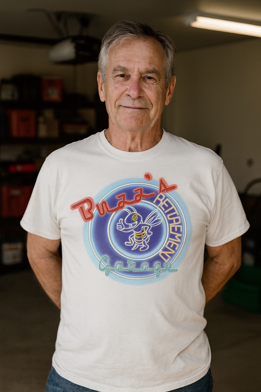 Man wearing a white t-shirt with a colorful graphic design in a garage setting